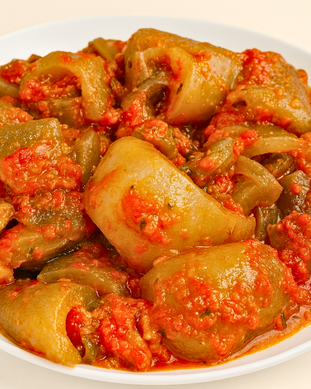 Pomo in pepper sauce