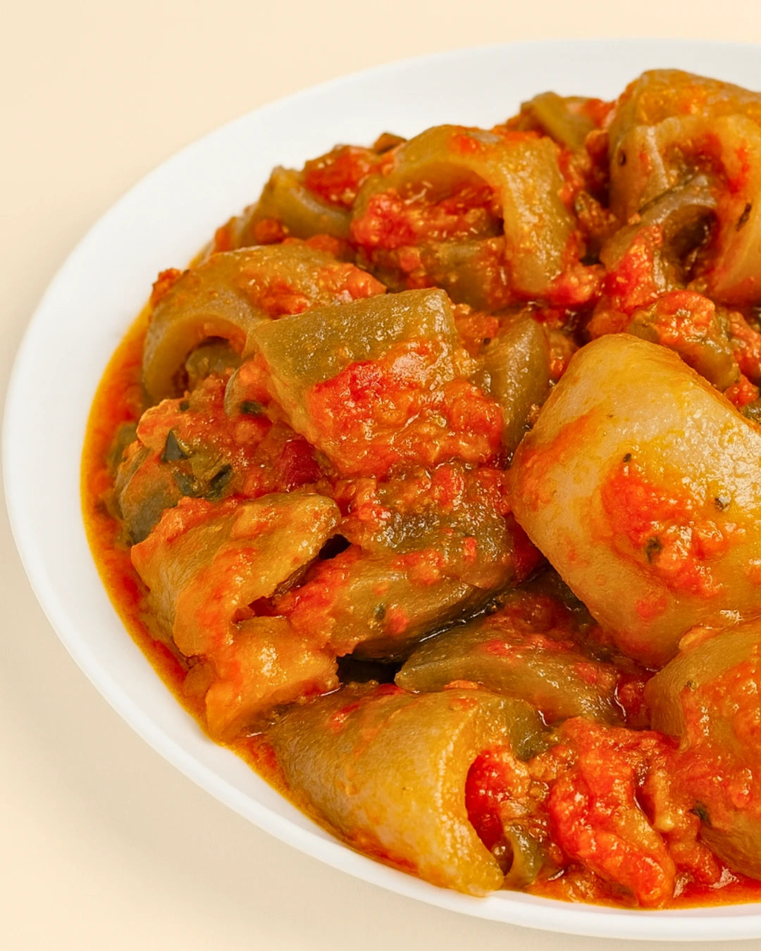 Pomo in pepper sauce